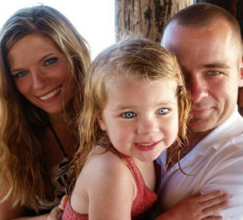 Holly Revord with her husband and daughter Raegan Revord